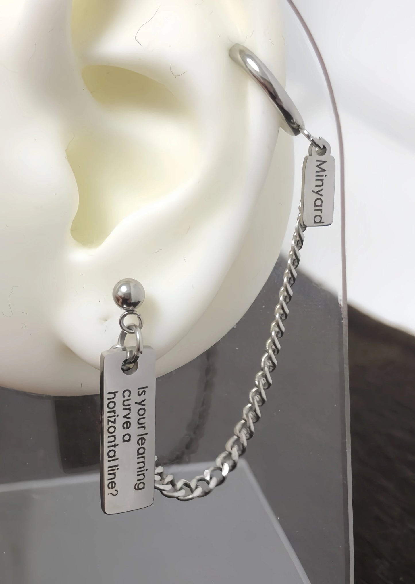 Andrew Minyard Learning Curve Earring